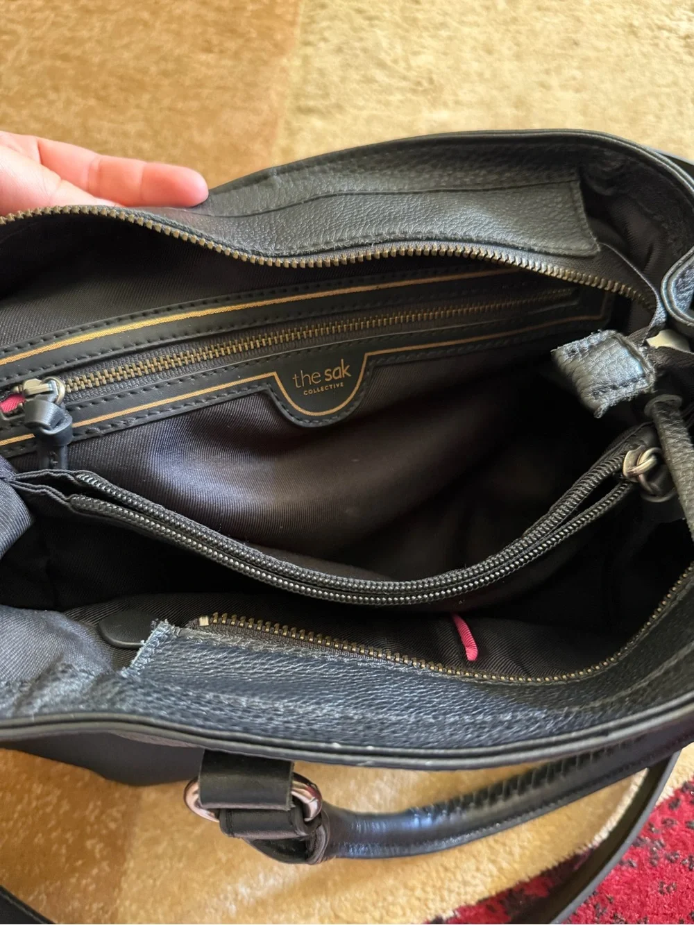 The Sak Black Leather Tote Bag with Tassel Accent